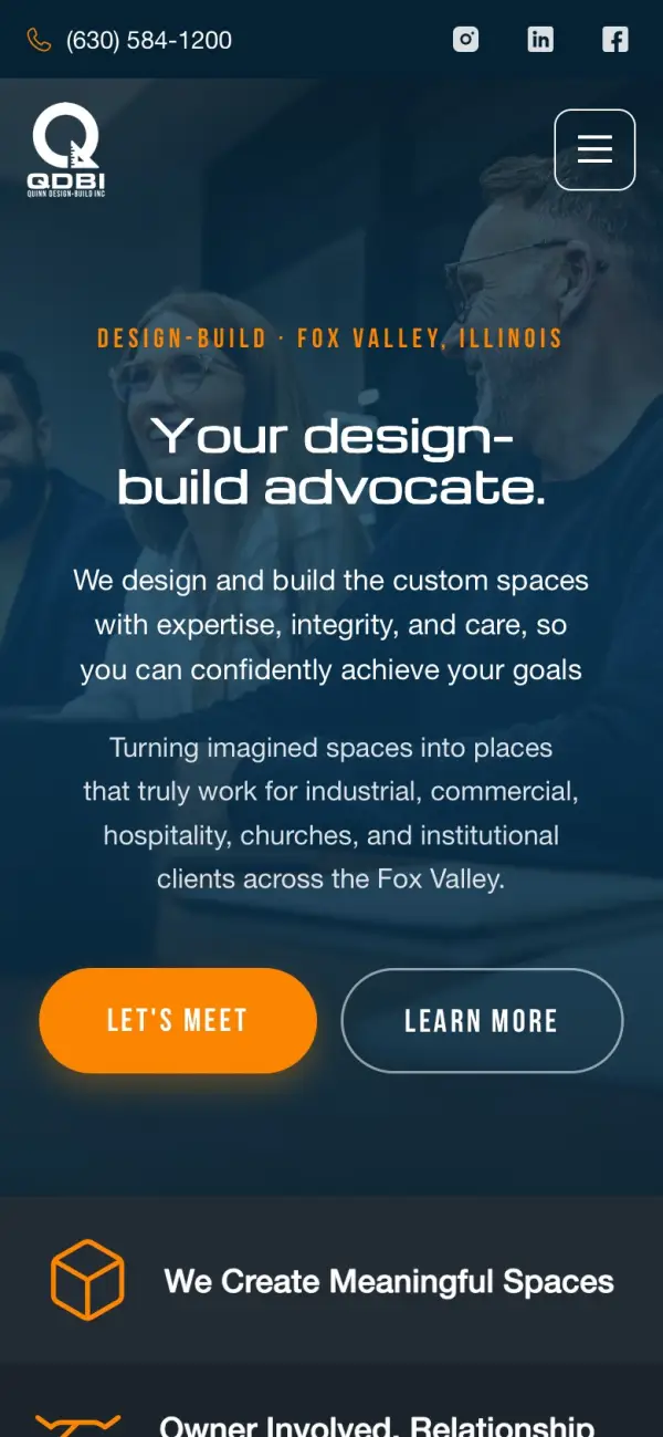 Quinn Design-Build, Inc. website on a phone
